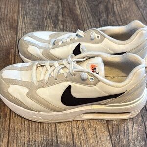Nike Cream and Black Athletic Shoes
